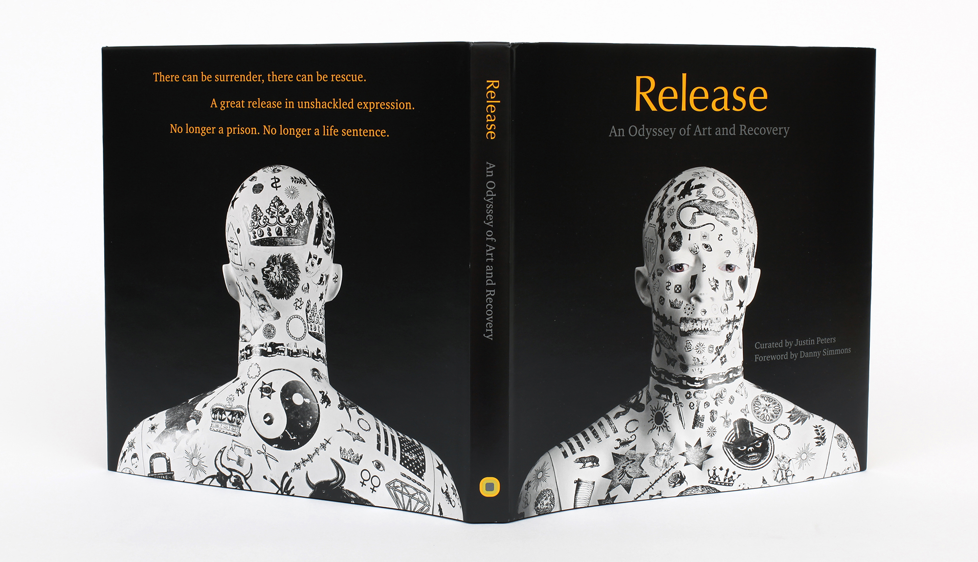 Close-up of Odyssey House art program coffee table book cover featuring client artwork and elegant typography