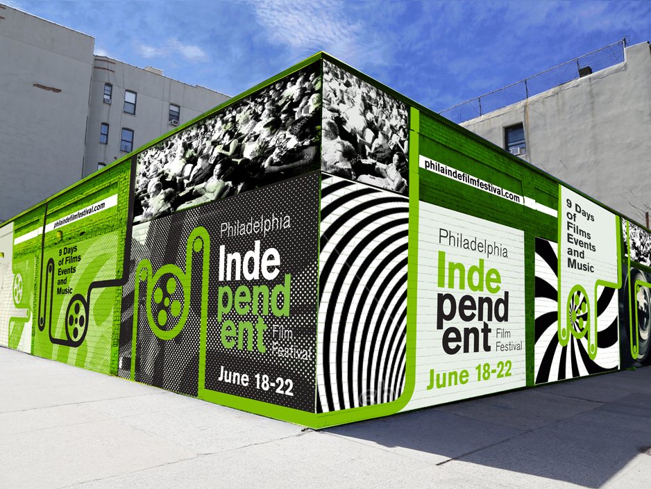 Street mural featuring large PIFF logo and festival branding on urban wall