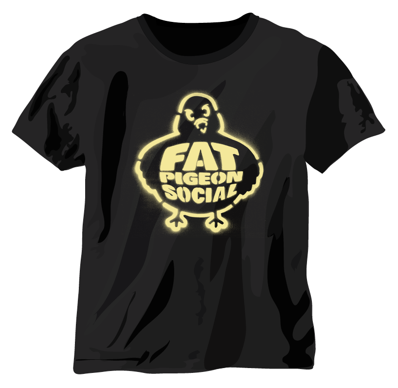 Black t-shirt featuring Fat Pigeon Social spray paint-style logo design in yellow, expressing creative street art aesthetic
